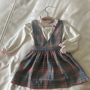 Mayoral plaid jumper dress and white long sleeve shirt with pink ruffle